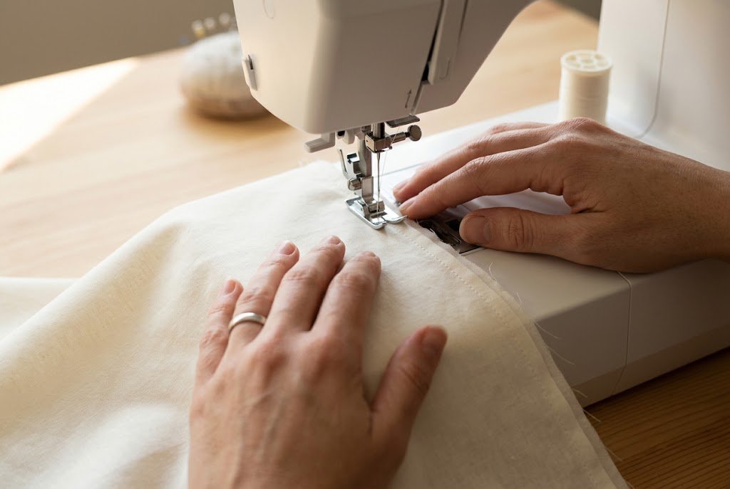 Sewing the first seam of a French seam with fabric placed wrong sides together